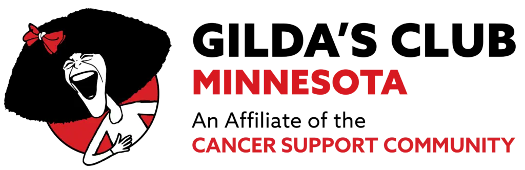 Gilda's Club Minnesota Cancer Support Community logo featuring a stylized laughing face with a red bow and bold red text
