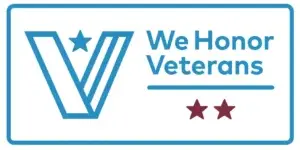 We Honor Veterans Level 2 horizontal badge with stylized blue V, star, and two maroon stars, honoring Minnesota Hospice's veteran care commitment.